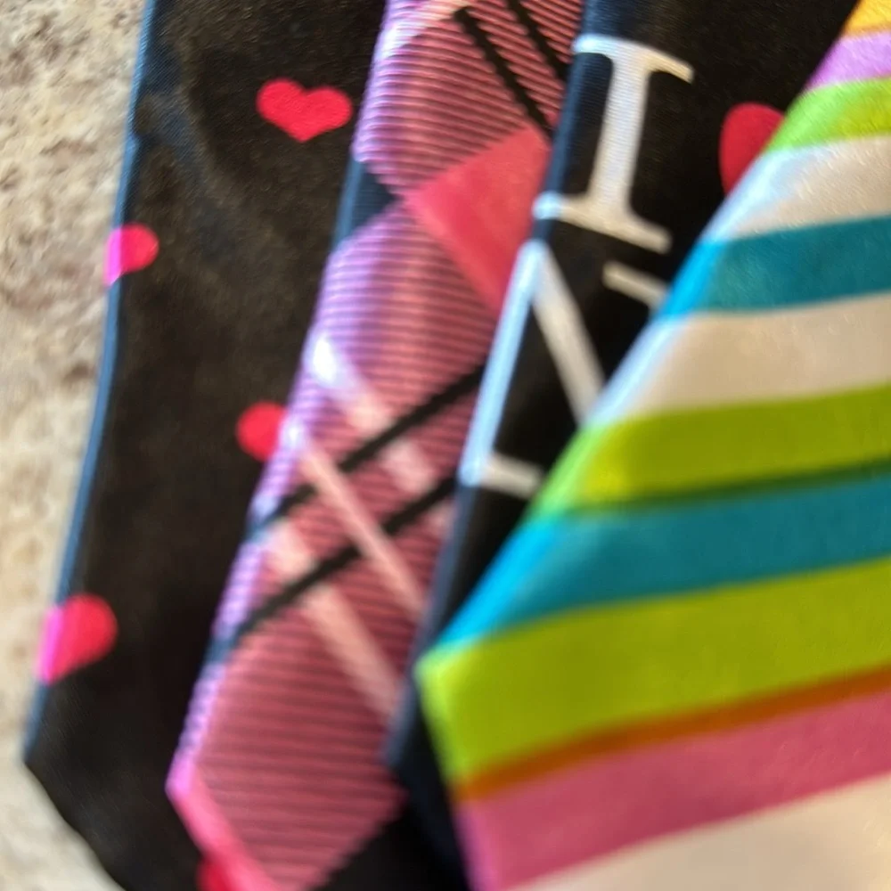 NWOT 10 inch unisex ties set of 4. Attached elastic cord goes under the collar